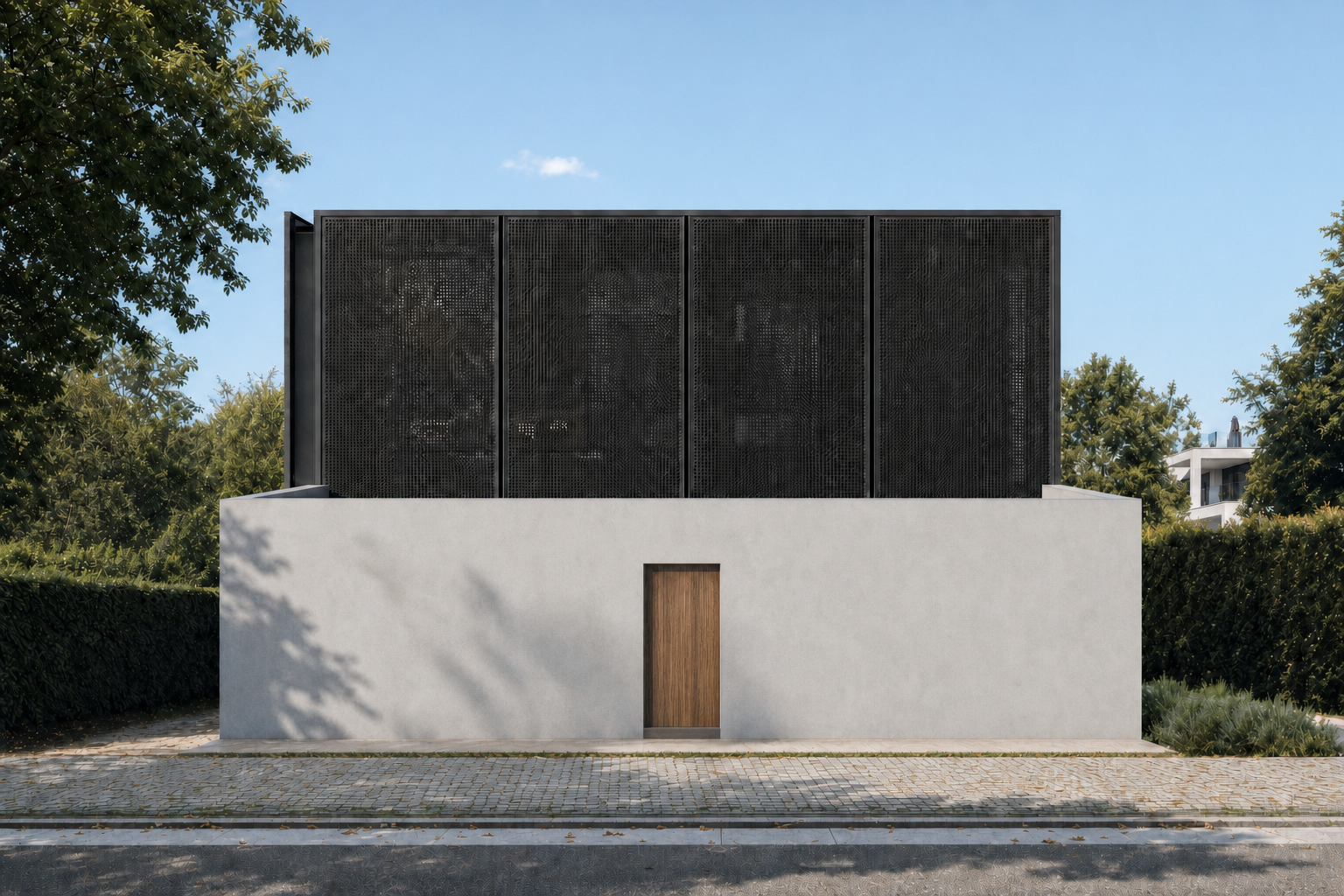 Two-storey house behind a perforated screen